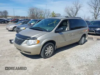 2005 Chrysler Town & Country Touring with VIN 2C4GP54LX5R132272, listed as a IAAI auction lot 41860741 with 138,402 mi miles and . Bid and sale history available at DreamBid. Image 2.
