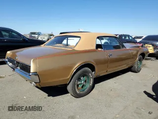 1967 Mercury Cougar z VIN 7F93A600409, wystawiony jako Copart lot #71630684 z przebiegiem 64 547 mil mil oraz Szkoda całkowita • Salvage title. Historia ofert i sprzedaży dostępna na DreamBid. Obrazek 3.