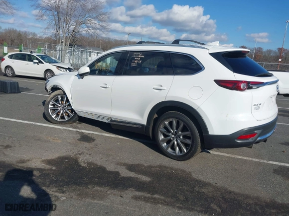 2018 Mazda CX-9 Grand Touring with VIN JM3TCBDY6J0200843, listed as a IAAI auction lot 40971233 with 94,770 mi miles. Bid and sale history available at carsss.com. Image 3.