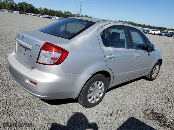 2010 Suzuki SX4 LE with VIN JS2YC5A20A6310306, listed as a Copart auction lot 76704424 with 123,149 mi miles and Salvage Title. Bid and sale history available at carsss.com. Image 3.