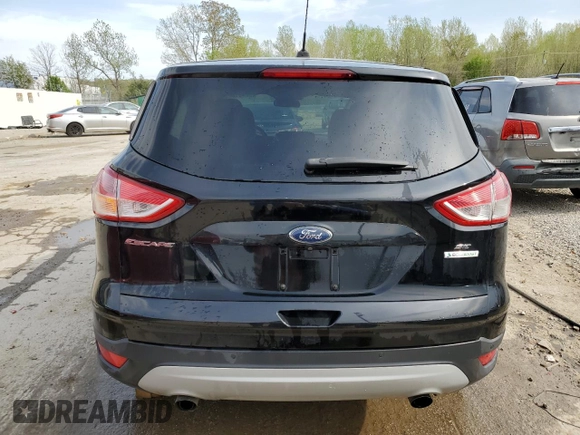 2016 Ford Escape SE z VIN 1FMCU0G99GUA13835, wystawiony jako Copart lot #52401865 z przebiegiem 130 143 mil mil oraz Szkoda całkowita • Salvage title. Historia ofert i sprzedaży dostępna na DreamBid. Obrazek 6.