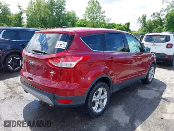 2016 Ford Escape SE z VIN 1FMCU9GX0GUB51525, wystawiony jako IAAI lot #42237629 z przebiegiem 76 616 mil mil oraz . Historia ofert i sprzedaży dostępna na DreamBid. Obrazek 4.