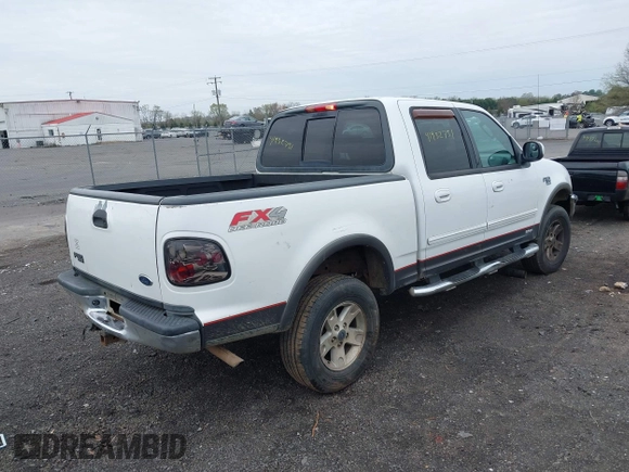 2003 Ford F-150 XLT with VIN 1FTRW08L43KA64328, listed as a IAAI auction lot 41932751 with 275,213 mi miles. Bid and sale history available at carsss.com. Image 4.