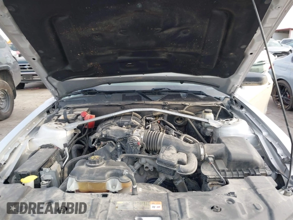 2014 Ford Mustang V6 with VIN 1ZVBP8EM8E5233906, listed as a IAAI auction lot 41590461 with 113,131 mi miles. Bid and sale history available at carsss.com. Image 10.