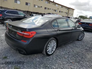 2017 BMW 7 Series with VIN WBA7F2C30HG423403, listed as a Copart auction lot 74029333 with 51,212 mi miles and . Bid and sale history available at DreamBid. Image 3.