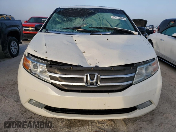 2012 Honda Odyssey Touring with VIN 5FNRL5H96CB144690, listed as a Copart auction lot 75176494 with 0 mi miles and Salvage Title. Bid and sale history available at carsss.com. Image 5.