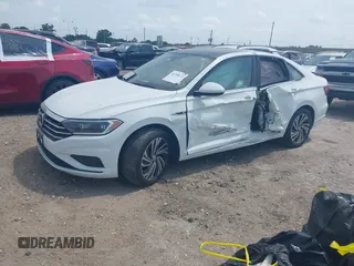 2020 Volkswagen Jetta SEL with VIN 3VWE57BU5LM101498, listed as a IAAI auction lot 42298171 with 28,597 mi miles and . Bid and sale history available at DreamBid. Image 2.