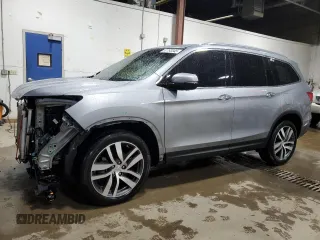 2018 Honda Pilot Touring with VIN 5FNYF6H97JB070668, listed as a Copart auction lot 57793345 with 103,364 mi miles and Salvage title. Bid and sale history available at DreamBid. Image 1.