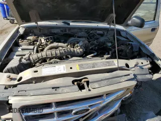 2001 Ford Ranger XL z VIN 1FTYR14U41PA85591, wystawiony jako Copart lot #59917615 z przebiegiem 257 547 mil mil oraz Szkoda całkowita • Salvage title. Historia ofert i sprzedaży dostępna na DreamBid. Obrazek 11.