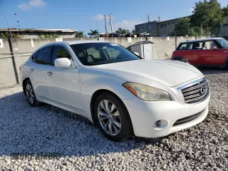 2013 Infiniti M37 with VIN JN1BY1AP0DM511986, listed as a Copart auction lot 86157824 with 125,464 mi miles and Salvage Title. Bid and sale history available at carsss.com. Image 4.