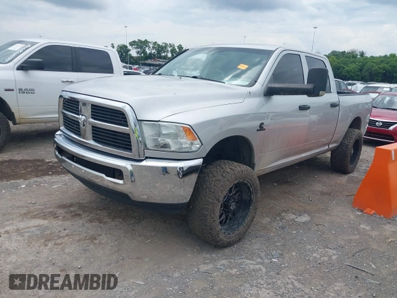 2012 Ram 2500 ST with VIN 3C6UD5CL5CG334735, listed as a IAAI auction lot 42439552 with 155,548 mi miles and . Bid and sale history available at DreamBid. Image 2.