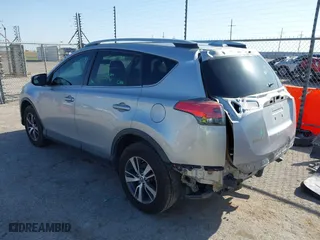 2016 Toyota RAV4 XLE with VIN 2T3WFREV1GW310309, listed as a IAAI auction lot 41993270 with 200,289 mi miles. Bid and sale history available at carsss.com. Image 3.