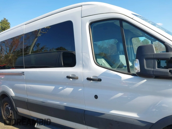 2018 Ford Transit Passenger XL with VIN 1FBAX2CM9JKA05167, listed as a IAAI auction lot 41010530 with 47,949 mi miles and . Bid and sale history available at DreamBid. Image 13.