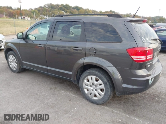 2018 Dodge Journey SE with VIN 3C4PDCABXJT170150, listed as a IAAI auction lot 40715756 with 113,330 mi miles and . Bid and sale history available at DreamBid. Image 3.