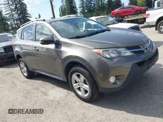 2013 Toyota RAV4 XLE with VIN JTMRFREV9DD024522, listed as a IAAI auction lot 42169755 with 164,493 mi miles and . Bid and sale history available at carsss.com. Image 1.