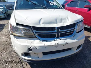 2013 Dodge Journey SE with VIN 3C4PDCAB0DT695464, listed as a IAAI auction lot 41899206 with 311,327 mi miles. Bid and sale history available at carsss.com. Image 6.