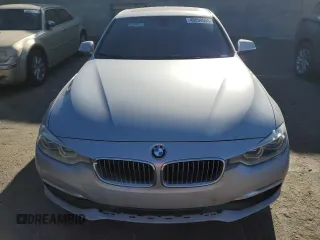 2016 BMW 3 Series with VIN WBA8F1C57GK438945, listed as a Copart auction lot 49090955 with 176,869 mi miles and Salvage title. Bid and sale history available at DreamBid. Image 5.