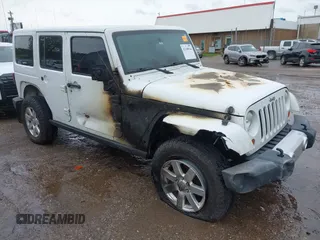 2013 Jeep Wrangler Unlimited Sahara with VIN 1C4BJWEG0DL559986, listed as a IAAI auction lot 42148964 with Not provided miles and . Bid and sale history available at DreamBid. Image 1.