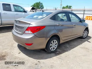 2012 Hyundai Accent GLS z VIN KMHCT4AE1CU186212, wystawiony jako IAAI lot #42247043 z przebiegiem 140 287 mil mil oraz . Historia ofert i sprzedaży dostępna na DreamBid. Obrazek 4.