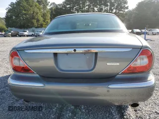 2005 Jaguar XJ with VIN SAJWA79C65SG45989, listed as a Copart auction lot 65357044 with 103,587 mi miles and Salvage Title. Bid and sale history available at carsss.com. Image 6.