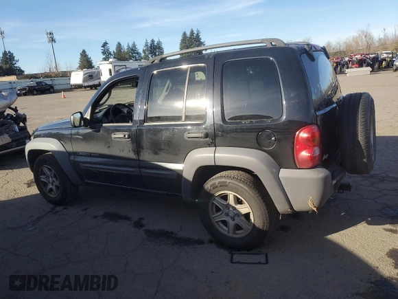 2003 Jeep Liberty Sport with VIN 1J4GK48KX3W658457, listed as a Copart auction lot 41863855 with 194,747 mi miles and Salvage Title. Bid and sale history available at DreamBid. Image 2.