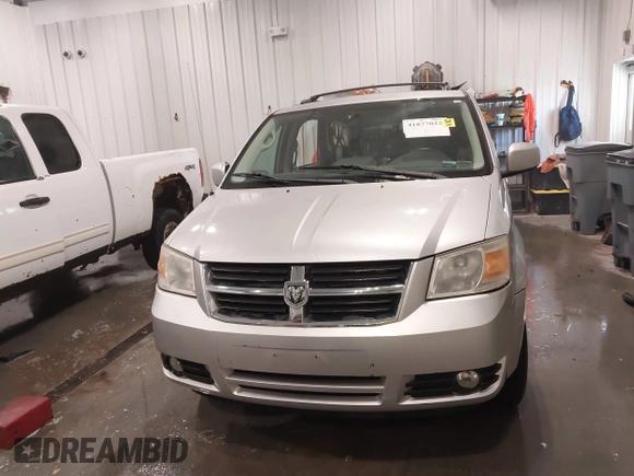 2010 Dodge Grand Caravan SXT with VIN 2D4RN5D15AR261319, listed as a IAAI auction lot 41877022 with 142,292 mi miles and . Bid and sale history available at DreamBid. Image 12.