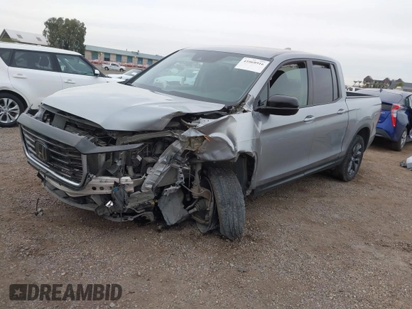 2023 Honda Ridgeline Sport z VIN 5FPYK3F16PB049866, wystawiony jako IAAI lot #41068916 z przebiegiem Nie podano mil oraz . Historia ofert i sprzedaży dostępna na DreamBid. Obrazek 17.