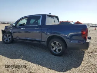 2021 Honda Ridgeline RTL-E with VIN 5FPYK3F75MB001663, listed as a Copart auction lot 61952705 with 52,093 mi miles and Salvage title. Bid and sale history available at DreamBid. Image 2.