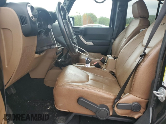 2017 Jeep Wrangler Unlimited Sahara with VIN 1C4BJWEG9HL633296, listed as a Copart auction lot 61387685 with 74,035 mi miles and Salvage title. Bid and sale history available at DreamBid. Image 7.