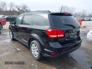 2019 Dodge Journey SE with VIN 3C4PDCBB8KT844800, listed as a IAAI auction lot 41721062 with 148,390 mi miles and . Bid and sale history available at DreamBid. Image 3.