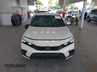 2022 Honda Civic Sport Touring z VIN 19XFL1H8XNE016822, wystawiony jako IAAI lot #42113420 z przebiegiem 30 361 mil mil oraz . Historia ofert i sprzedaży dostępna na DreamBid. Obrazek 12.