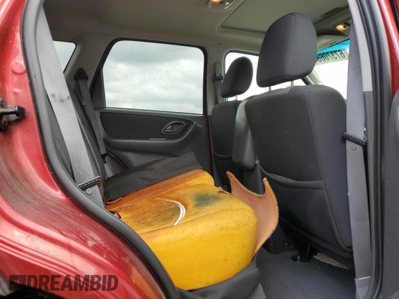 2005 Mazda Tribute S with VIN 4F2CZ04125KM19257, listed as a Copart auction lot 67370664 with 140,348 mi miles and Salvage Title. Bid and sale history available at DreamBid. Image 10.