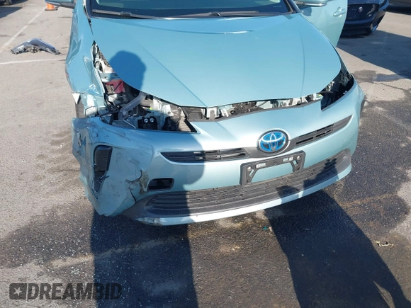 2022 Toyota Prius L Eco with VIN JTDKAMFU8N3188831, listed as a IAAI auction lot 42021222 with 39,629 mi miles and . Bid and sale history available at DreamBid. Image 6.