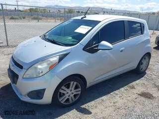 2014 Chevrolet Spark LT with VIN KL8CD6S91EC551097, listed as a IAAI auction lot 41975175 with 98,996 mi miles. Bid and sale history available at carsss.com. Image 2.