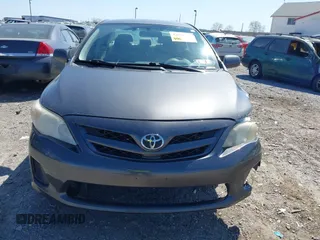 2011 Toyota Corolla L with VIN JTDBU4EE4B9144190, listed as a IAAI auction lot 42060728 with 115,299 mi miles. Bid and sale history available at carsss.com. Image 12.