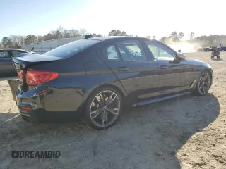 2020 BMW 5 Series M550i xDrive with VIN WBAJS7C0XLCE44248, listed as a Copart auction lot 48660045 with 73,949 mi miles and Salvage title. Bid and sale history available at DreamBid. Image 3.