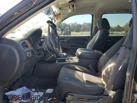 2011 Chevrolet Suburban LS with VIN 1GNSCHE0XBR294973, listed as a Copart auction lot 77258024 with 193,139 mi miles and Salvage Title. Bid and sale history available at carsss.com. Image 7.