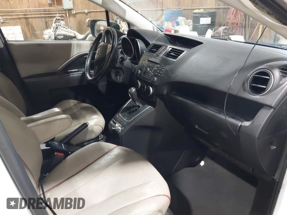 2012 Mazda 5 Grand Touring with VIN JM1CW2DL9C0100114, listed as a IAAI auction lot 42038998 with 160,651 mi miles and . Bid and sale history available at DreamBid. Image 5.