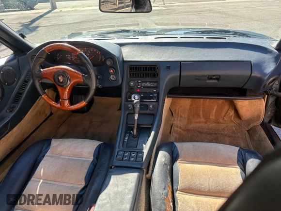 1987 Porsche 928 z VIN WP0JB0921HS862257, wystawiony jako Copart lot #76322184 z przebiegiem 159 733 mil mil oraz Czysty tytuł • Clean title. Historia ofert i sprzedaży dostępna na DreamBid. Obrazek 9.