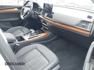 2021 Audi Q5 Premium Plus z VIN WA1E2AFY5M2071265, wystawiony jako IAAI lot #42348388 z przebiegiem 25 924 mil mil oraz . Historia ofert i sprzedaży dostępna na DreamBid. Obrazek 5.