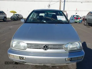 1999 Volkswagen Golf z VIN 3VWJA81HXXM215507, wystawiony jako IAAI lot #41391464 z przebiegiem 167 875 mil mil oraz . Historia ofert i sprzedaży dostępna na DreamBid. Obrazek 6.
