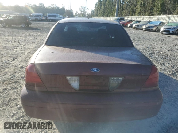 2006 Ford Police Interceptor with VIN 2FAFP71W06X165970, listed as a Copart auction lot 76293344 with 180,661 mi miles and Salvage title. Bid and sale history available at DreamBid. Image 6.