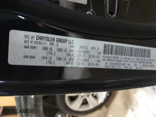 2014 Jeep Patriot Latitude with VIN 1C4NJRFBXED510937, listed as a IAAI auction lot 41577060 with 146,403 mi miles. Bid and sale history available at carsss.com. Image 9.