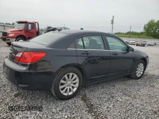 2010 Chrysler Sebring Limited with VIN 1C3CC5FB1AN141307, listed as a Copart auction lot 56379385 with 142,141 mi miles and Clean Title. Bid and sale history available at DreamBid. Image 3.