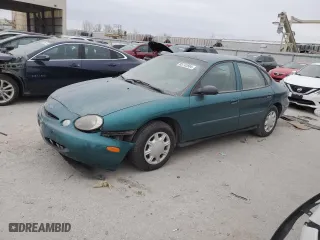 1997 Ford Taurus G with VIN 1FALP51U2VG299048, listed as a Copart auction lot 85742504 with 123,356 mi miles and Salvage Title. Bid and sale history available at carsss.com. Image 1.