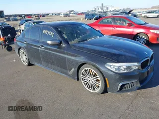 2018 BMW 5 Series M550i xDrive with VIN WBAJB9C59JG463948, listed as a IAAI auction lot 41845989 with 99,385 mi miles. Bid and sale history available at carsss.com. Image 1.