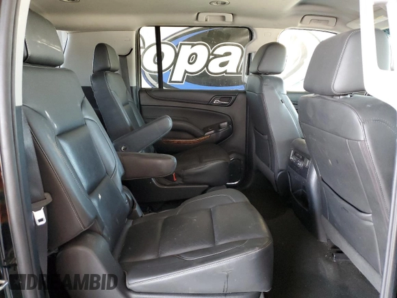 2018 Chevrolet Suburban Premier z VIN 1GNSCJKC7JR126793, wystawiony jako Copart lot #56399825 z przebiegiem 86 225 mil mil oraz Nie do naprawy • Non repairable. Historia ofert i sprzedaży dostępna na DreamBid. Obrazek 11.