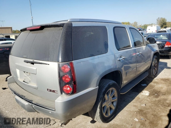 2013 GMC Yukon Denali with VIN 1GKS2EEF0DR311141, listed as a Copart auction lot 74823594 with 125,580 mi miles and Salvage Title. Bid and sale history available at carsss.com. Image 3.