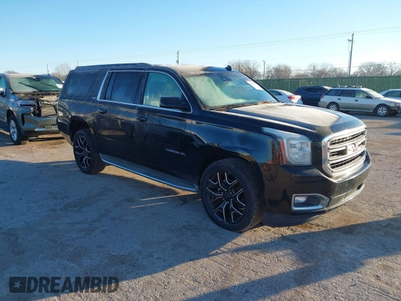 2015 GMC Yukon XL SLT with VIN 1GKS1HKC3FR250207, listed as a IAAI auction lot 41424234 with 183,233 mi miles. Bid and sale history available at carsss.com. Image 1.