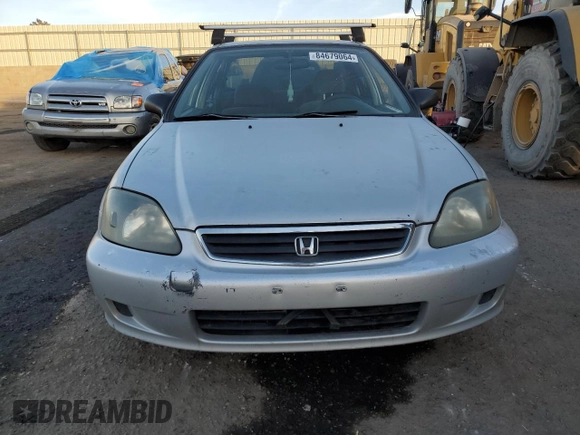 1999 Honda Civic LX z VIN JHMEJ6673XS001134, wystawiony jako Copart lot #42090765 z przebiegiem 265 318 mil mil oraz Szkoda całkowita • Salvage title. Historia ofert i sprzedaży dostępna na DreamBid. Obrazek 5.